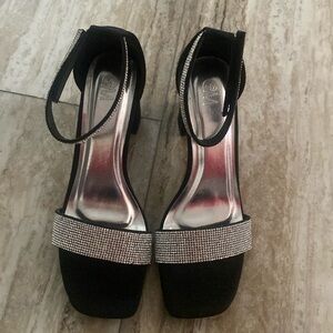 Size 8.5 black heel with silver sparkly details brand new never worn